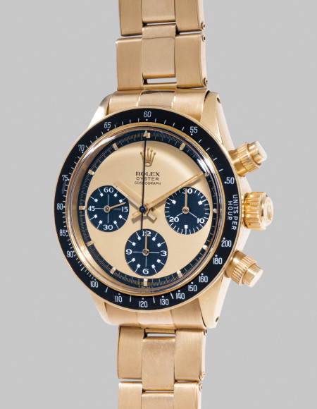 Rolex Ref. 6263 Oyster Cosmograph "Paul Newman" Редкий хронограф Rolex в желтом золоте c «лимонным» циферблатом и белыми часовыми метками. Оценочная стоимость: CHF 800–1600 тыс.