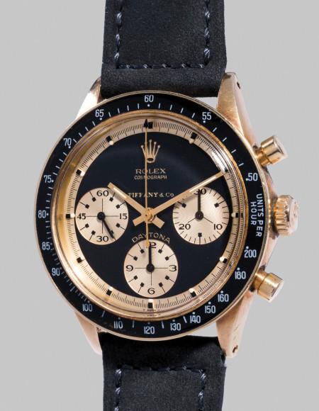 Rolex Ref. 6241 Cosmograph Daytona "John Player Special Paul Newman" Редкий и уникальный наручный хронограф Rolex в желтом золоте, проданный Tiffany & Co. Оценочная стоимость: CHF 400–800 тыс.