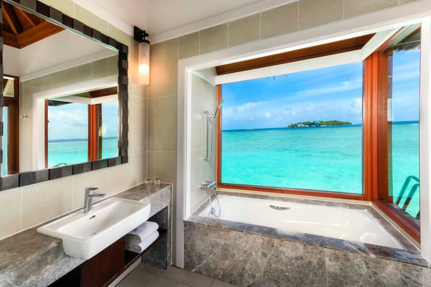 Водная вилла в Sheraton Maldives Full Moon Resort & Spa