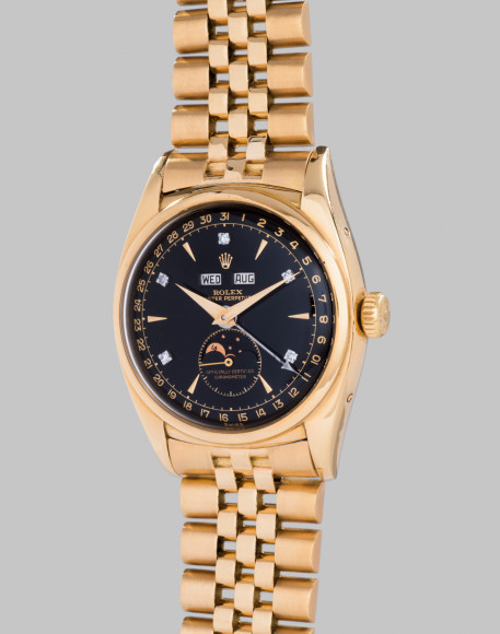Rolex Ref. 6062 Bao Dai Исторически значимые наручные часы. Желтое золото с черным циферблатом и алмазными индексами, с календарем и индикатором фаз Луны.