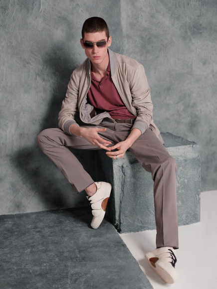 Бомбер, поло, брюки, кеды, очки — все Ermenegildo Zegna