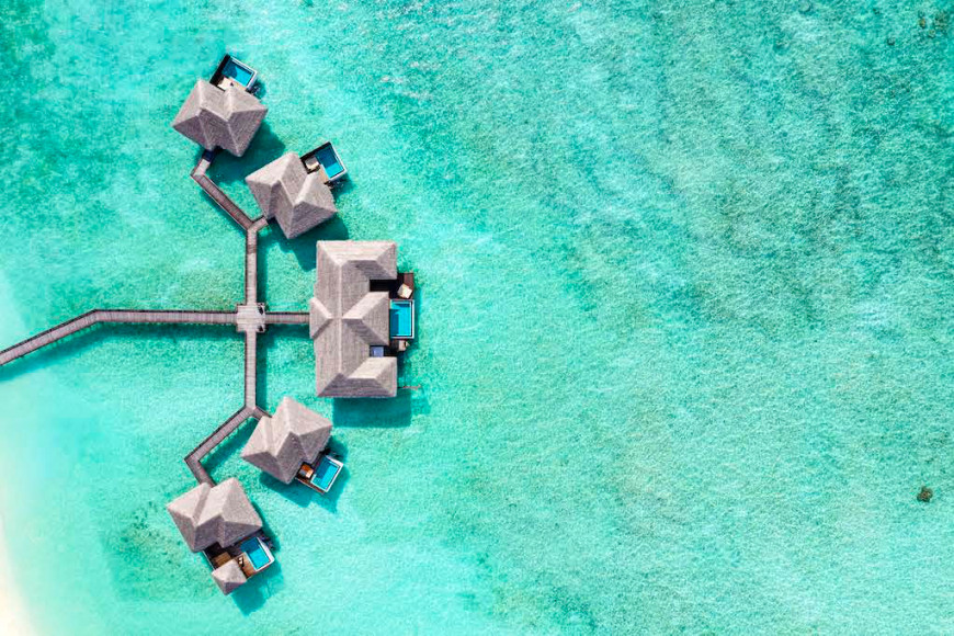 Водные виллы в Sheraton Maldives Full Moon Resort & Spa
